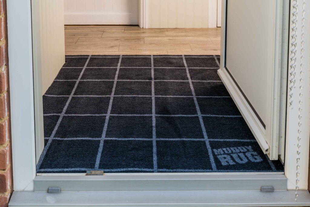 Car rug in entryway