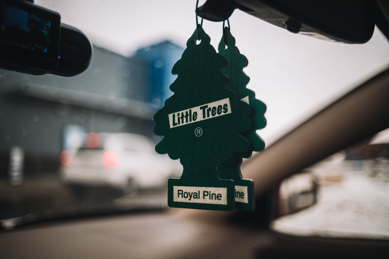 green car air freshener trees.