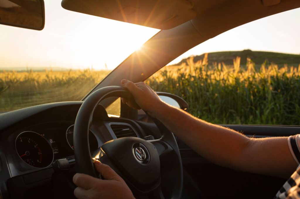 driving car in summer with sunlight